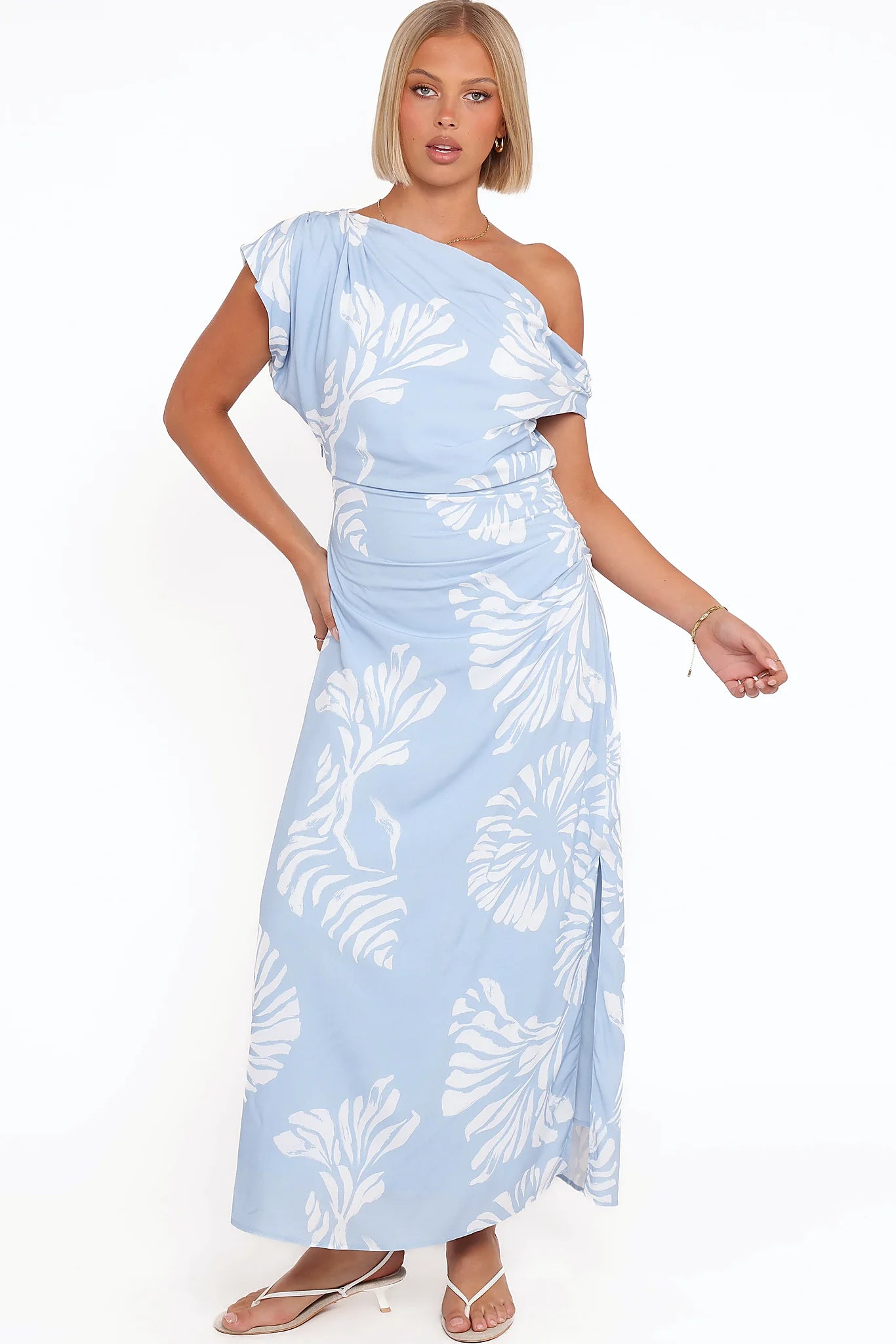 Detail view of the shell print one-shoulder midi dress