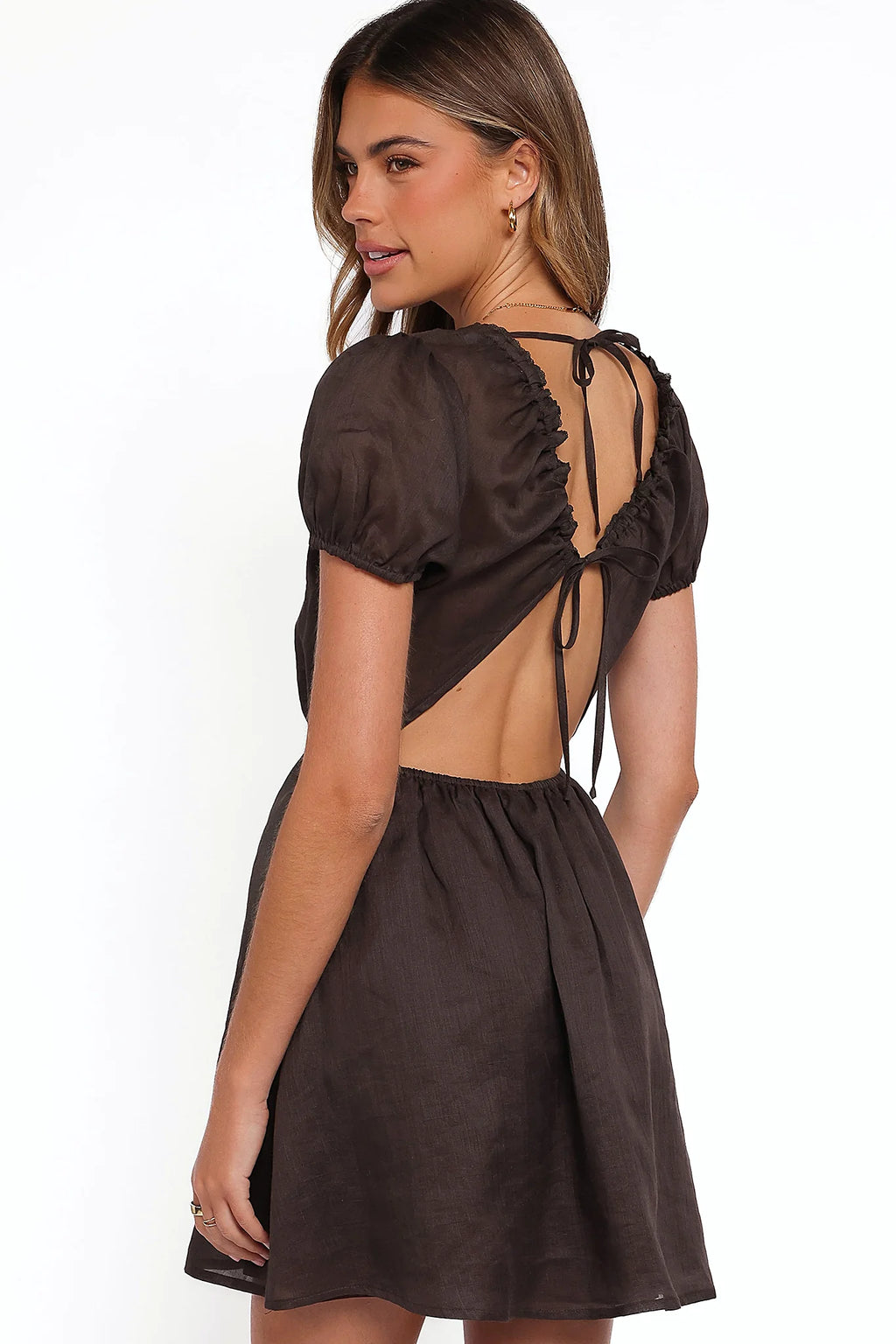 Side view showing the drape of the espresso mini dress