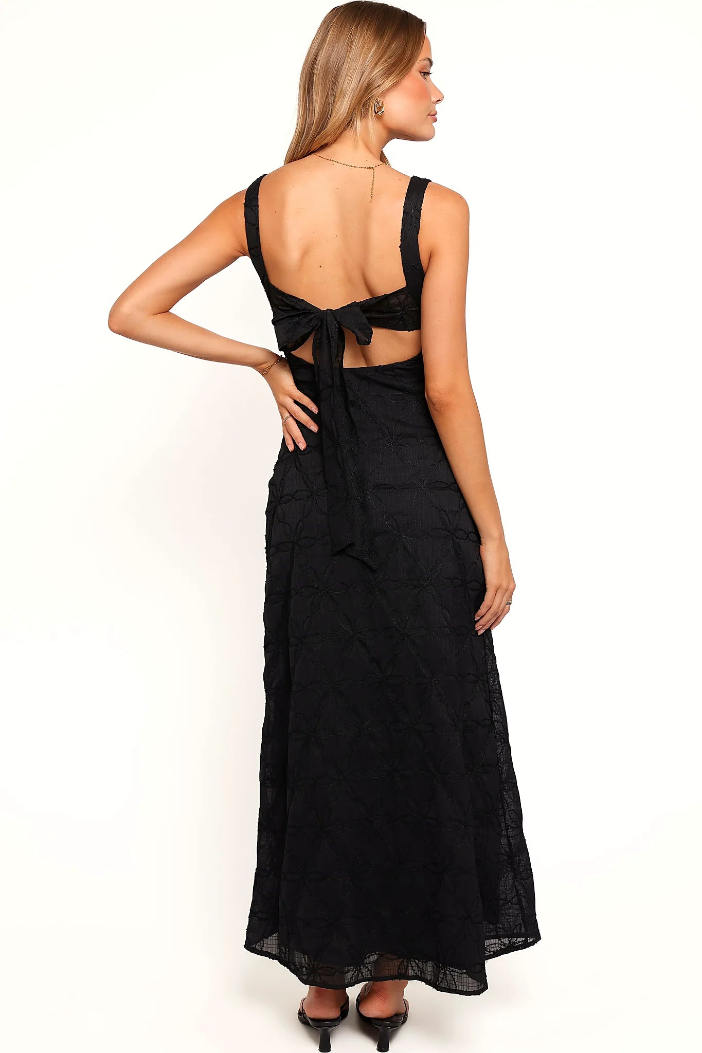 Detail view of the black floral embroidered maxi dress