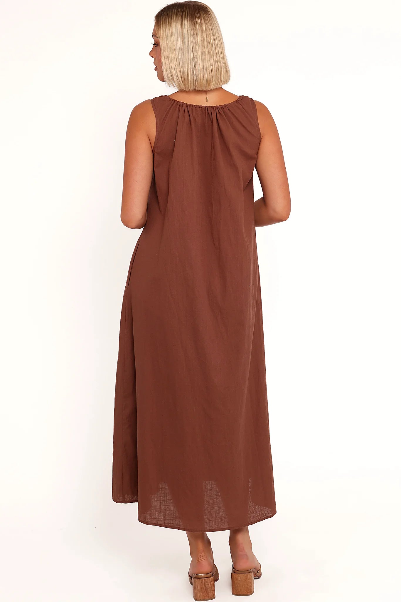 Detail view of the chocolate brown tie-front maxi dress