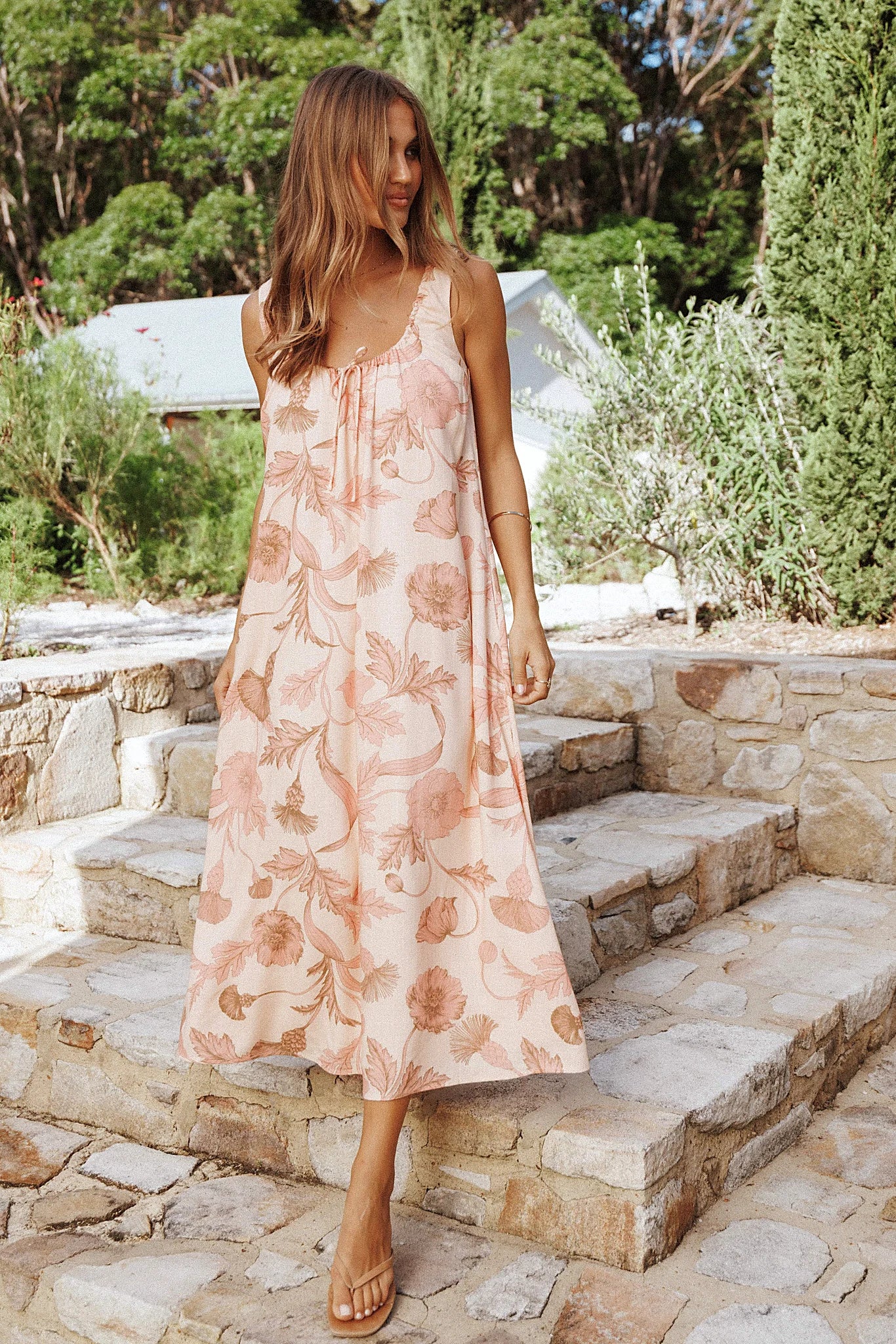 Full-length view of the pink floral maxi dress