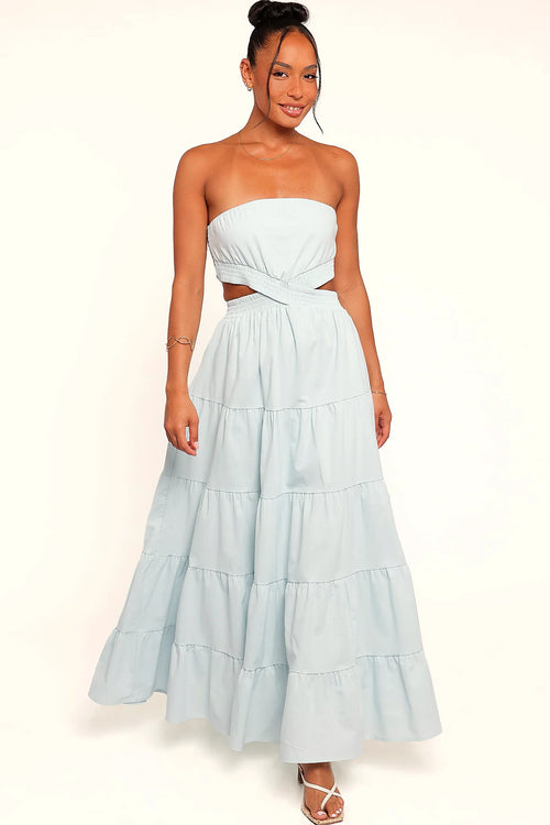 Back view of the blue strapless maxi dress on a model