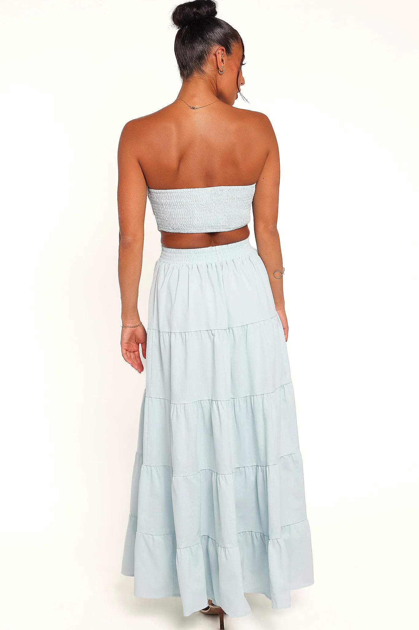 Detail view of the blue strapless maxi dress
