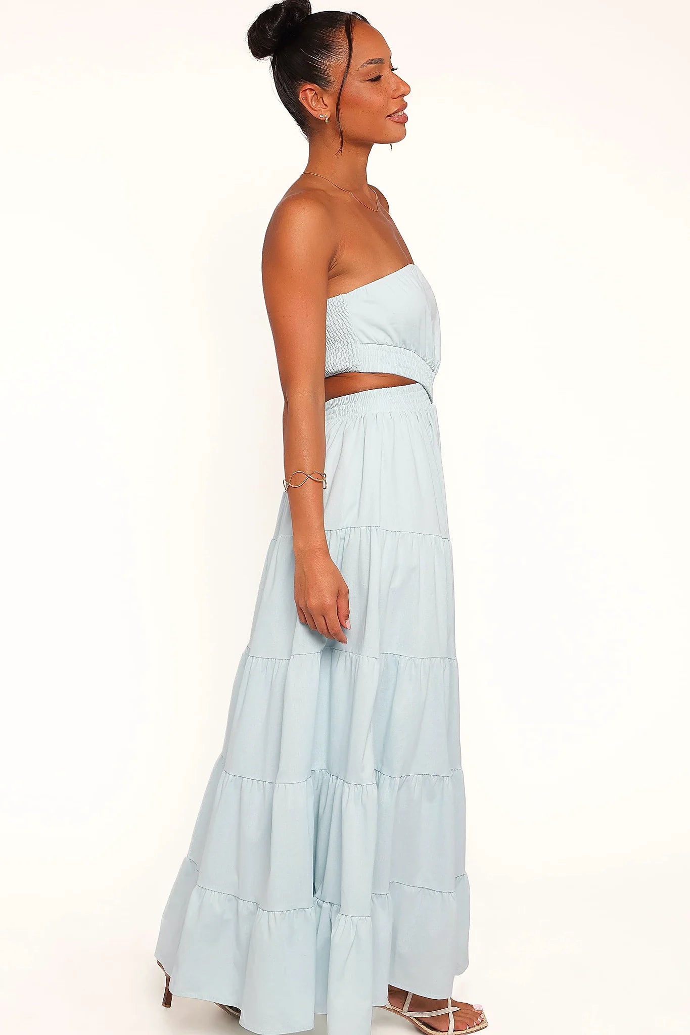 Full-length view of the blue strapless maxi dress