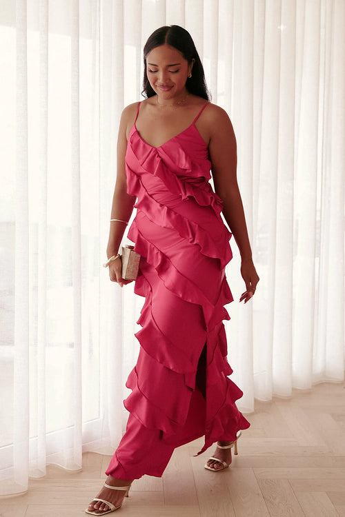 Model wearing the fuchsia ruffle satin maxi dress, front view