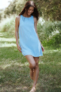 Back view of the blue mini dress on a model