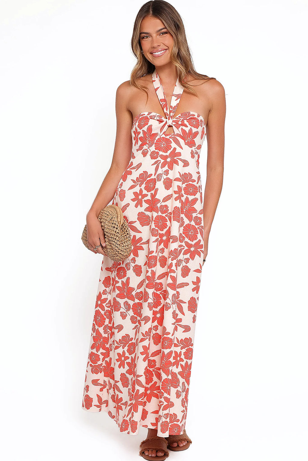 Model wearing the red floral maxi dress, front view
