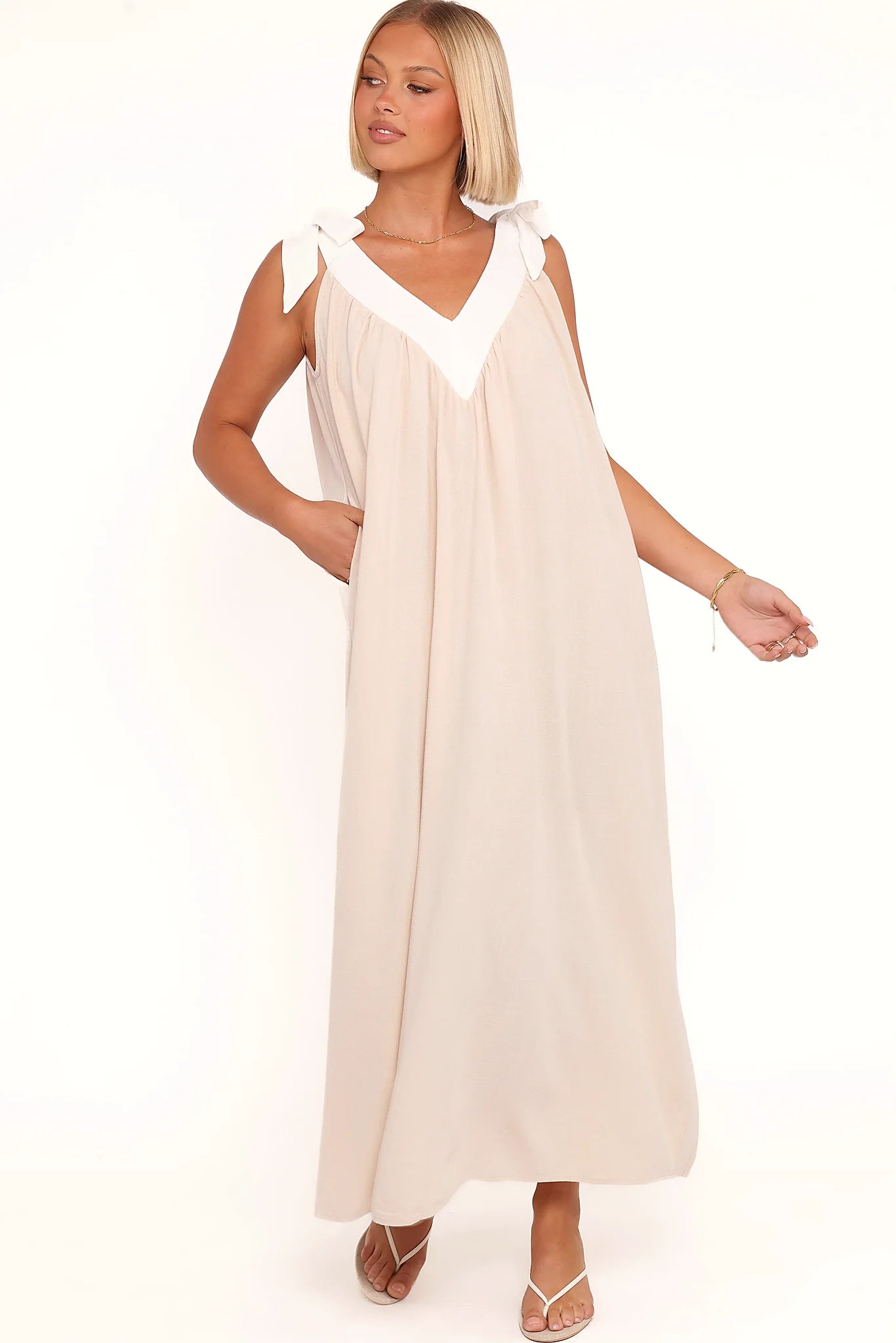 Detail view of the oatmeal v-neck maxi dress