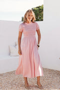 Full-length view of the pink puff-sleeve maxi dress