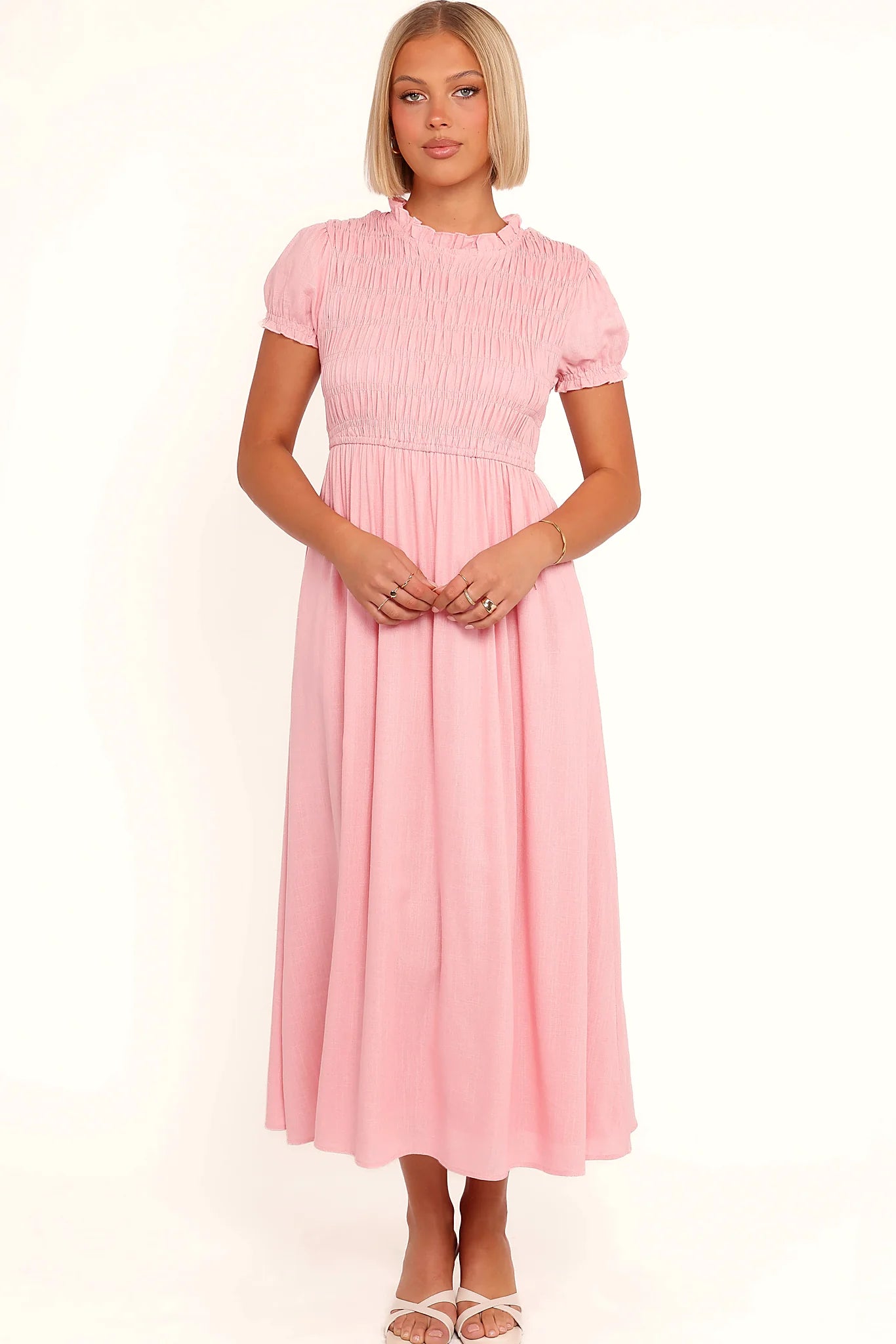 Detail view of the pink puff-sleeve maxi dress