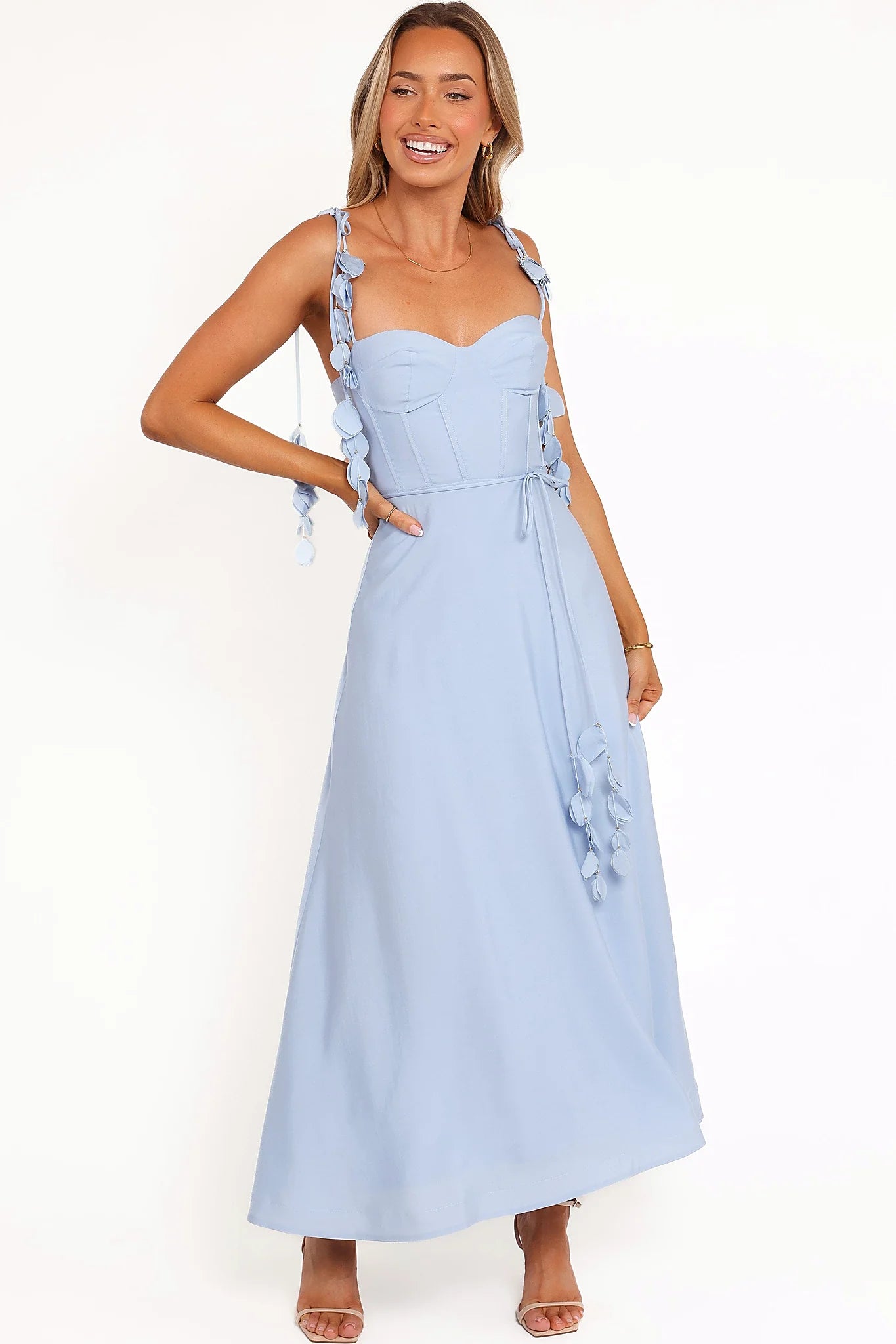 Close-up of the neckline of the pale blue sweetheart midi dress