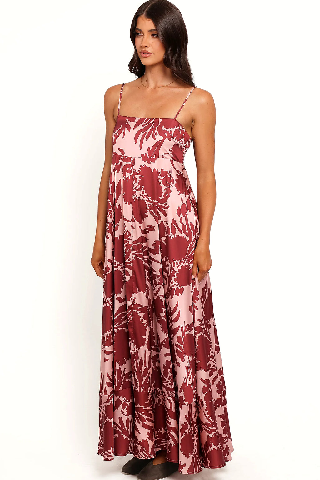 Back view of the pale burgundy floral maxi dress on a model
