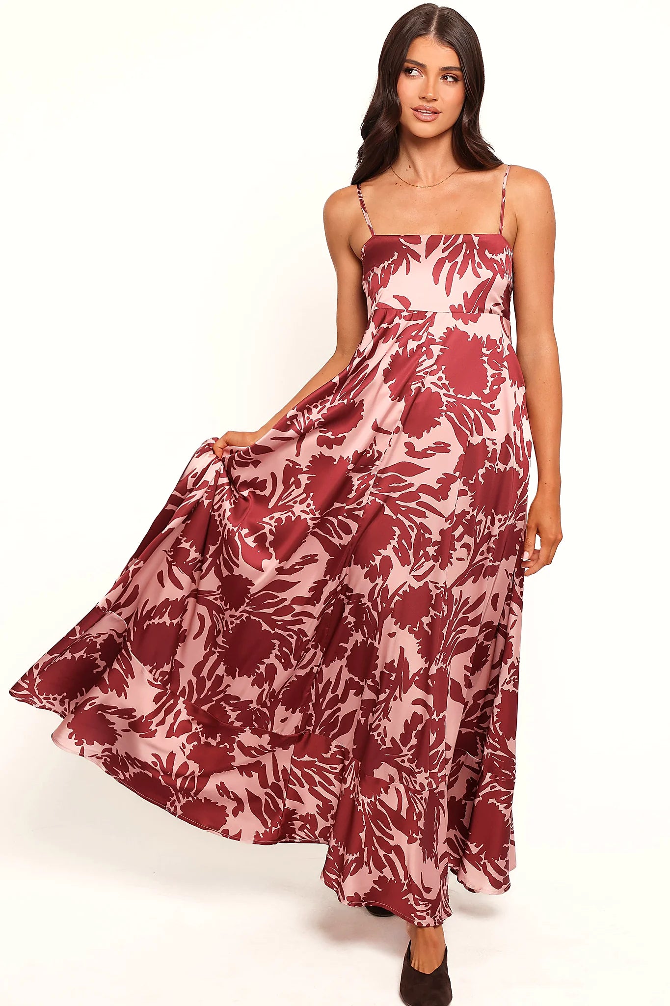 Close-up of the neckline of the pale burgundy floral maxi dress
