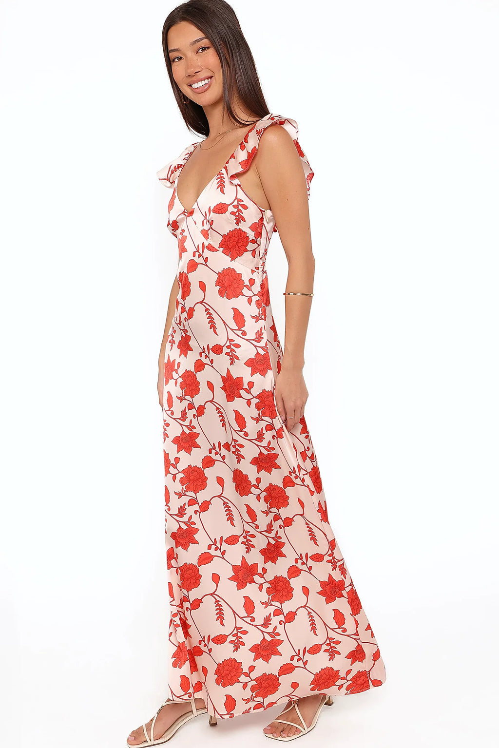 Model wearing the red floral maxi dress, front view