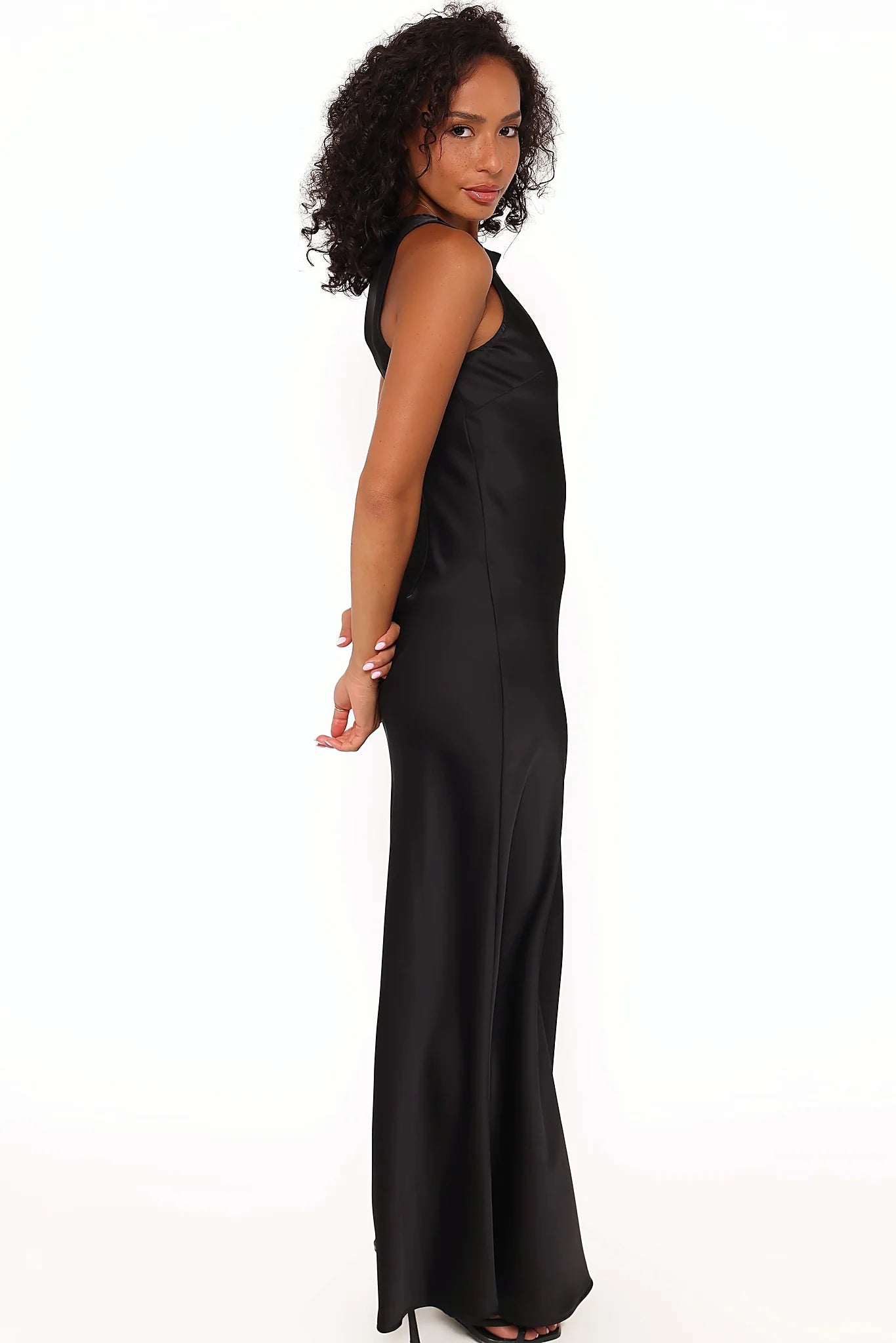 Model wearing the black maxi dress, front view