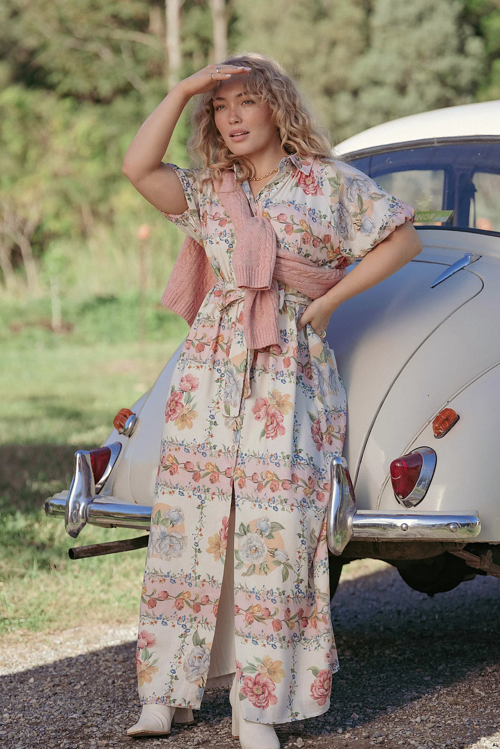 Back view of the rose tile button-through maxi dress on a model