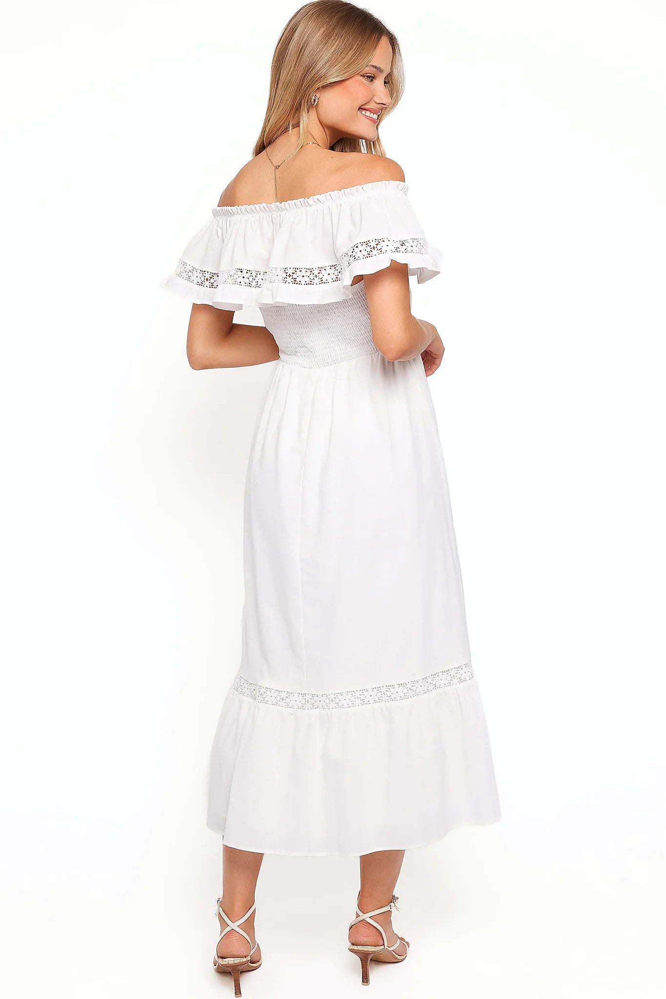 Detail view of the white floral lace maxi dress