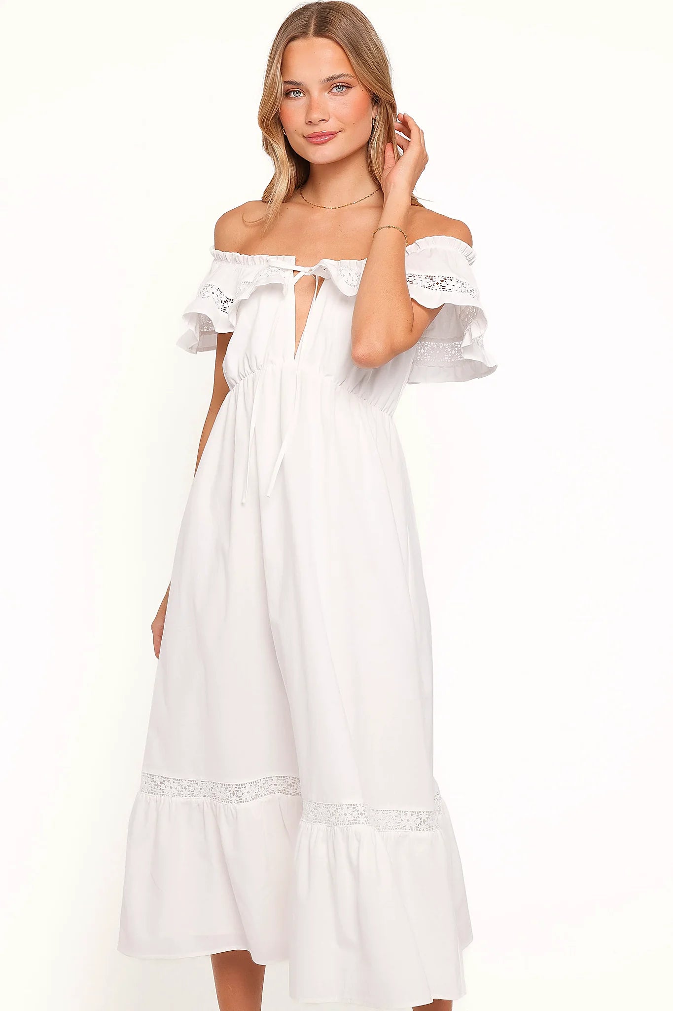 Full-length view of the white floral lace maxi dress