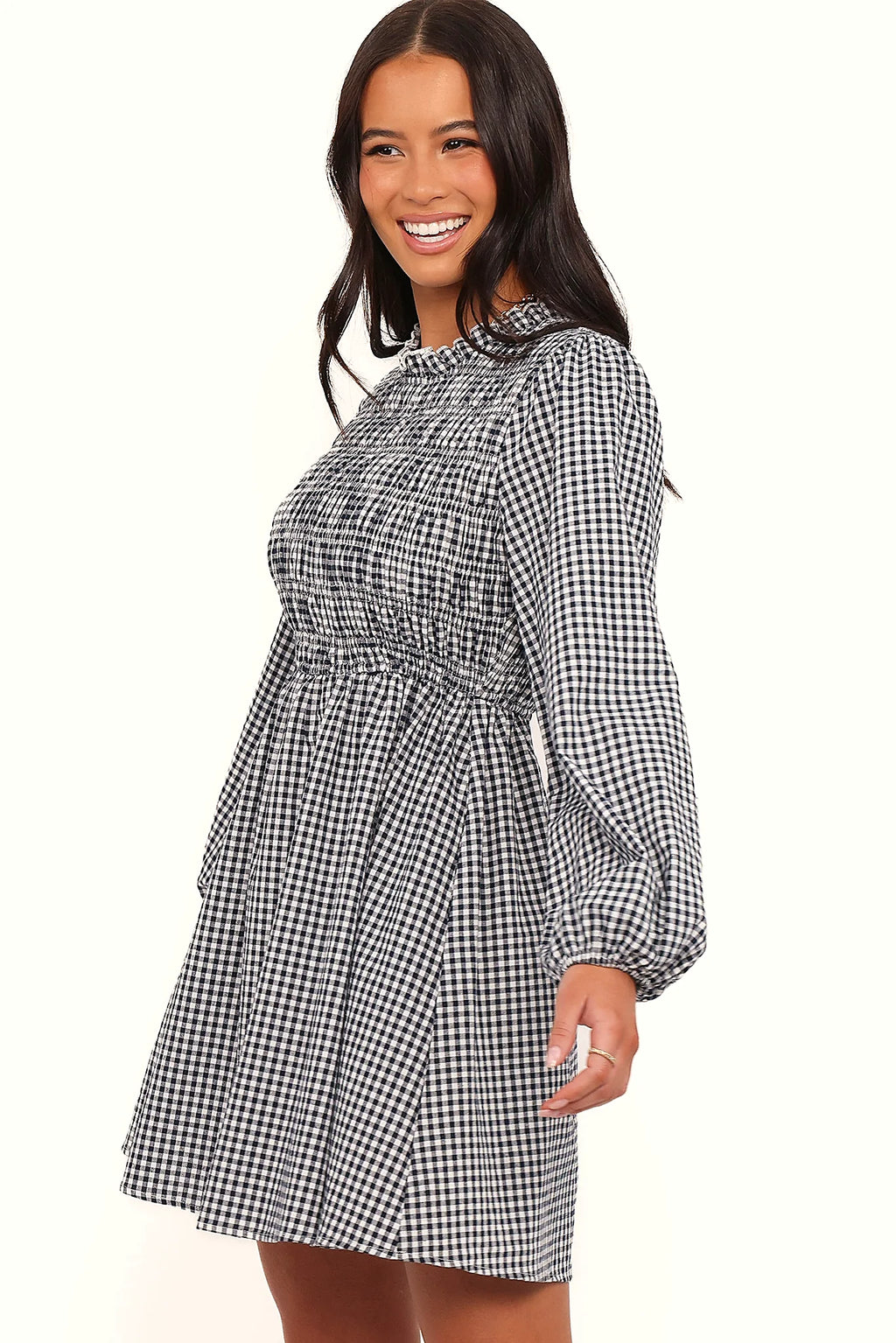 Full-length view of the navy gingham long sleeve mini dress