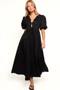 Detail view of the black empire waist maxi dress