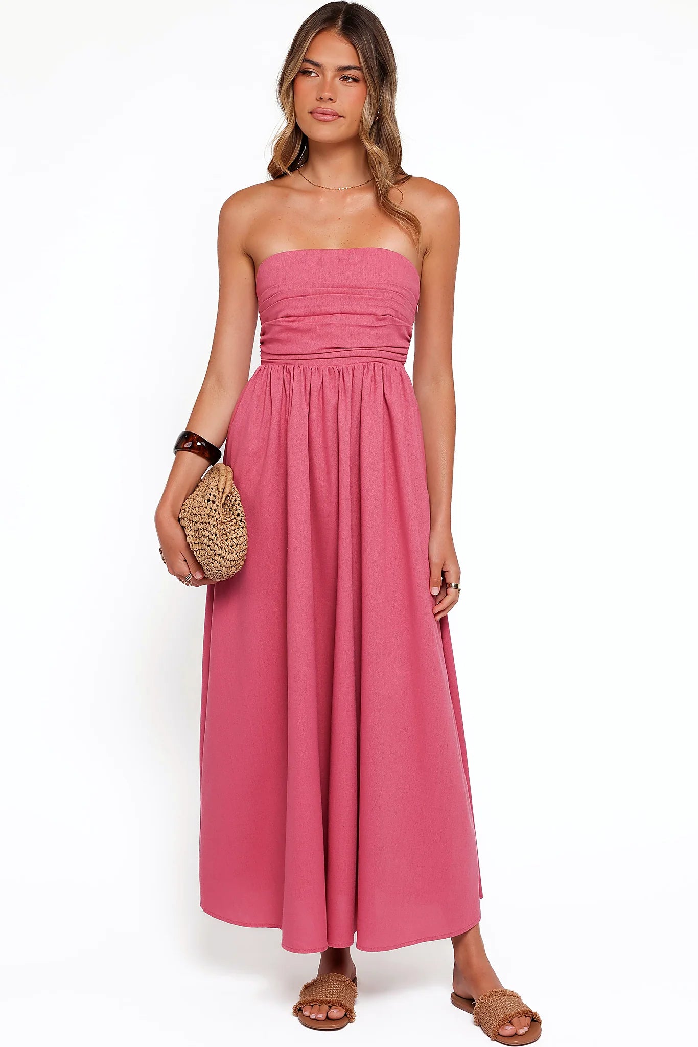 Close-up of the neckline of the petal pink strapless maxi dress