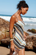 Back view of the brown retro stripe mini dress on a model