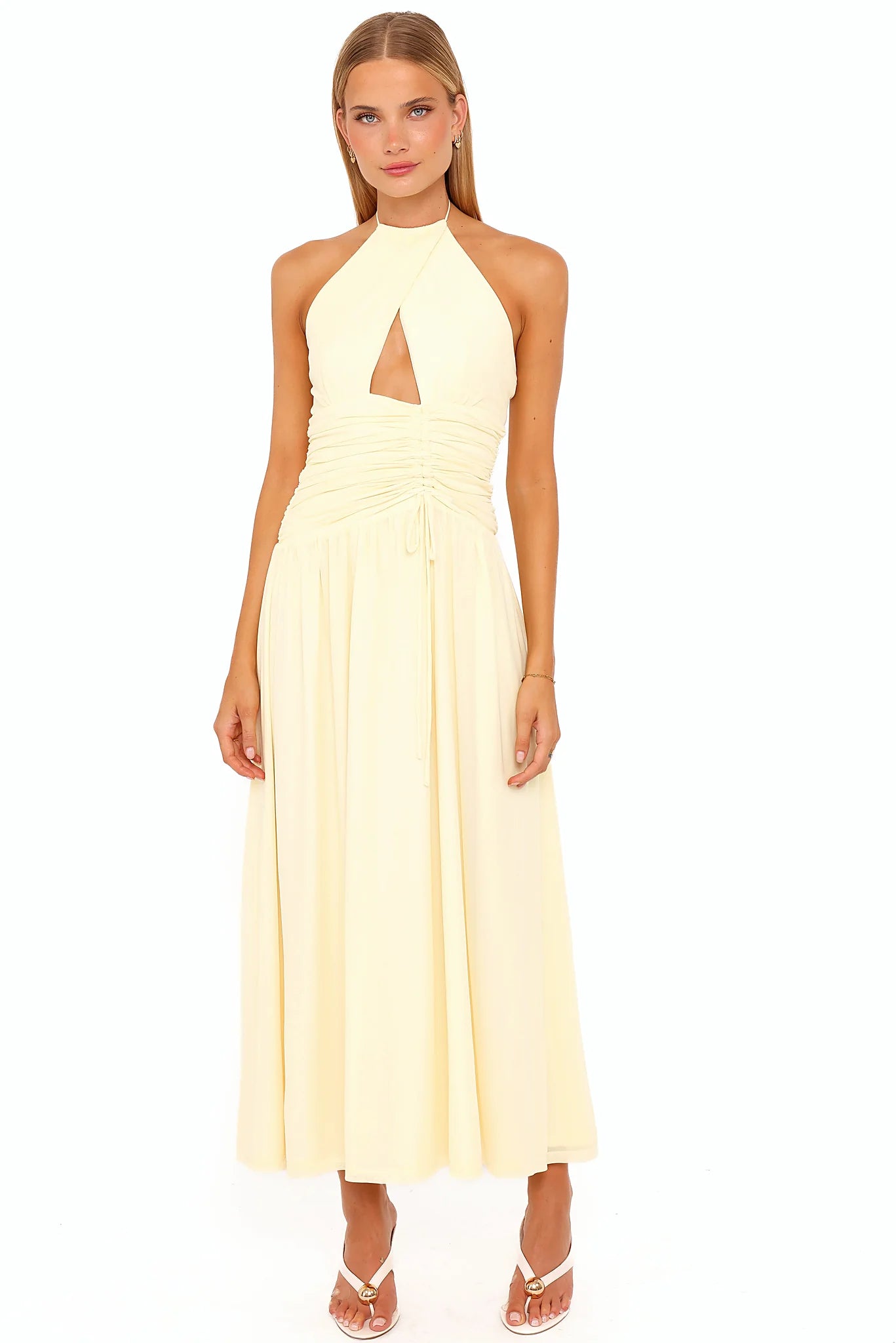 Back view of the butter yellow maxi dress on a model
