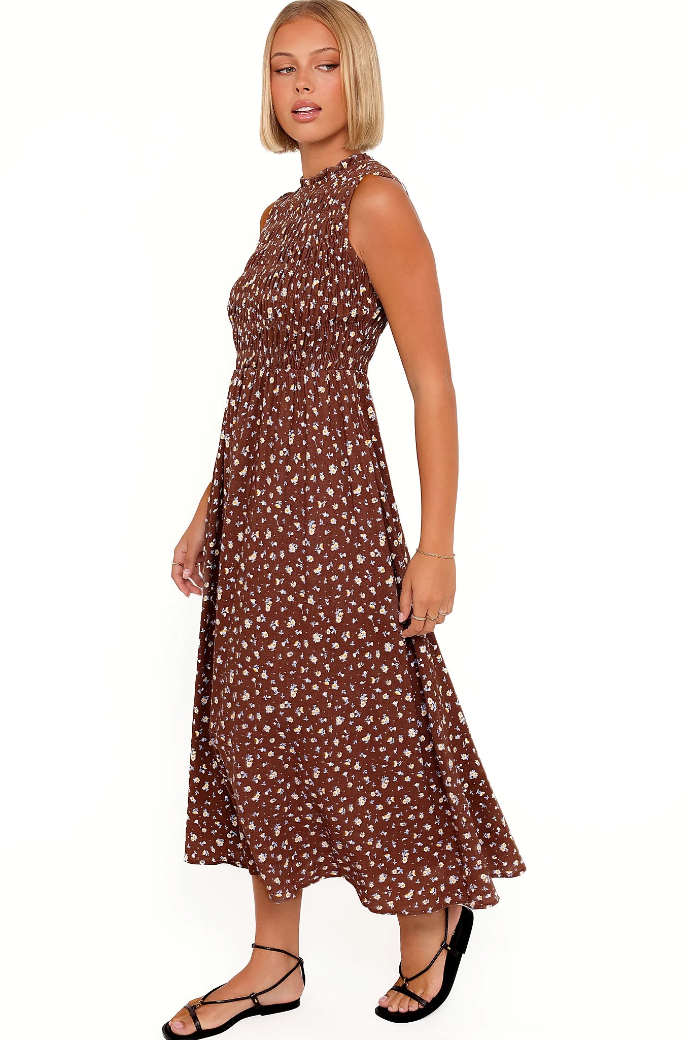 Detail view of the brown floral frill-neck maxi dress