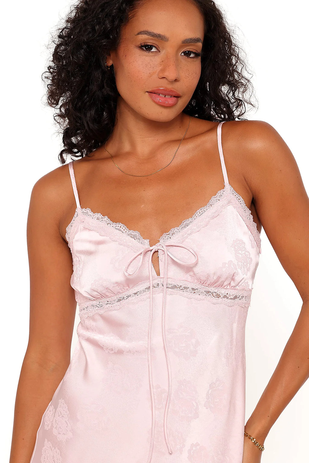 Detail view of the pink lace maxi dress