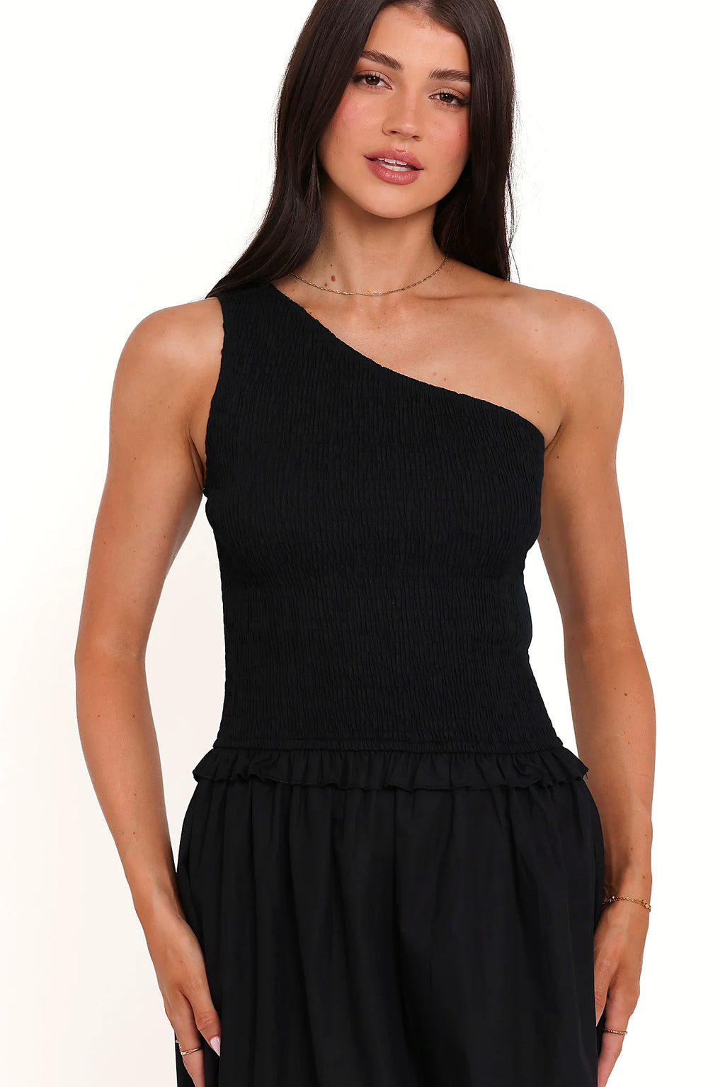 Back view of the black one-shoulder maxi dress on a model