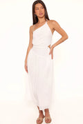 Back view of the white floral midi dress on a model