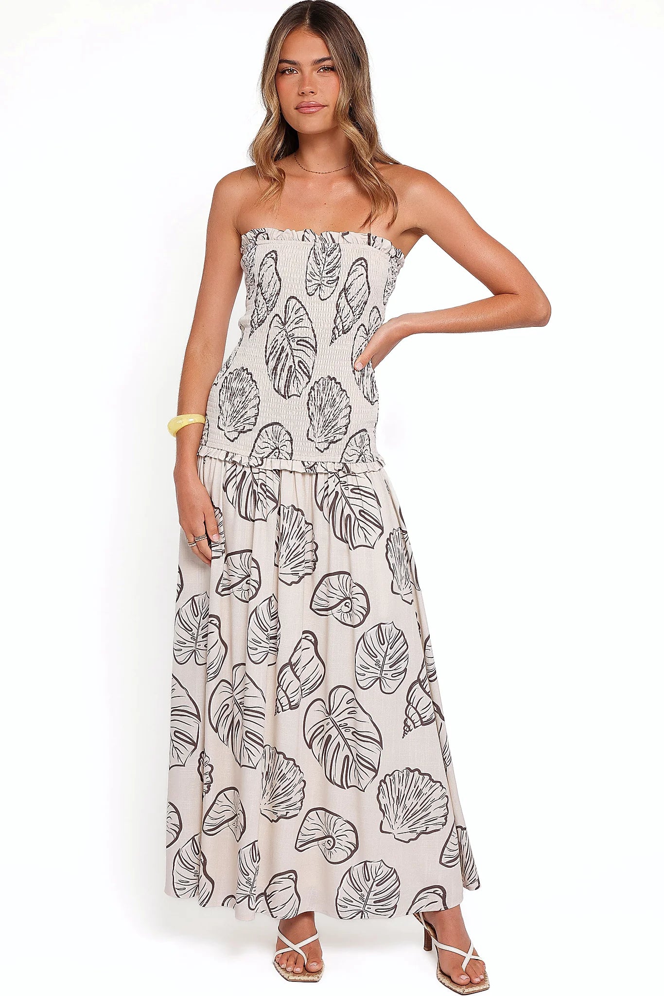 Full-length view of the cream shells maxi dress