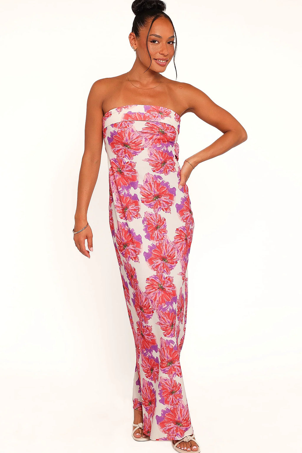 Side view showing the drape of the pink floral strapless maxi dress