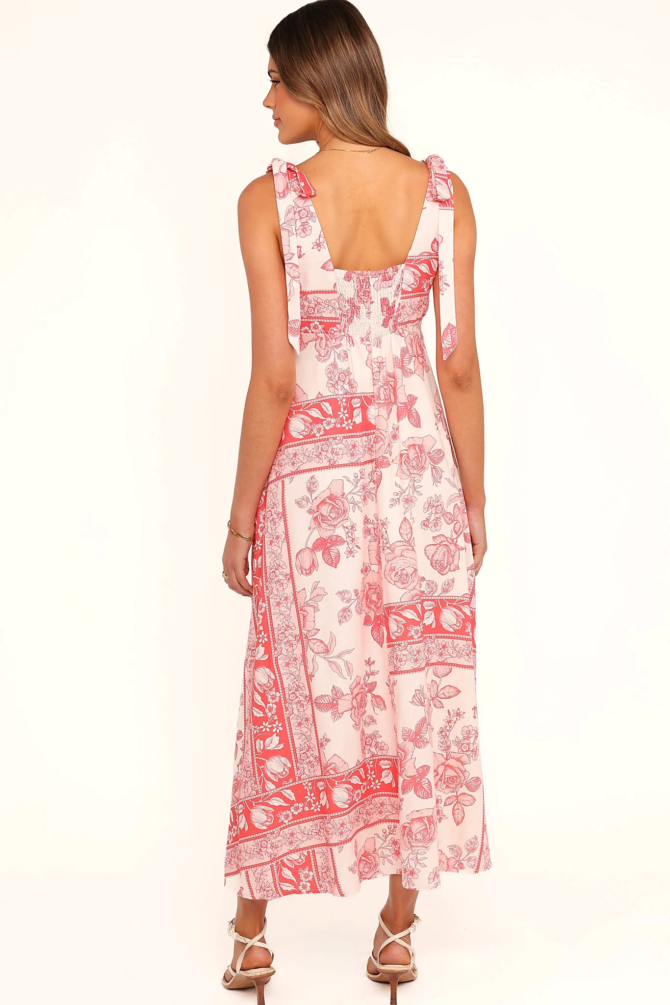 Close-up of the neckline of the rose tile tie-shoulder maxi dress