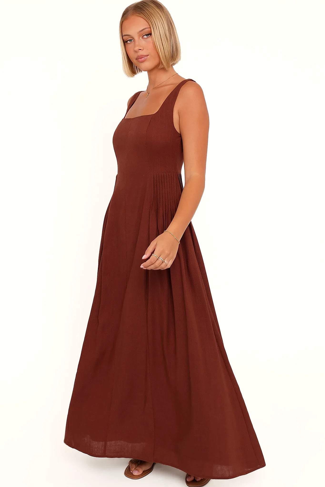 Model wearing the brown maxi dress, front view