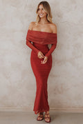 Back view of the burgundy spot off-shoulder maxi dress on a model
