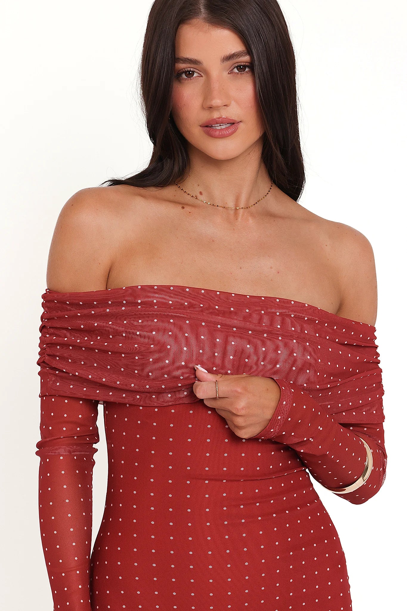 Full-length view of the burgundy spot off-shoulder maxi dress